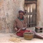Fatima shelling peanuts